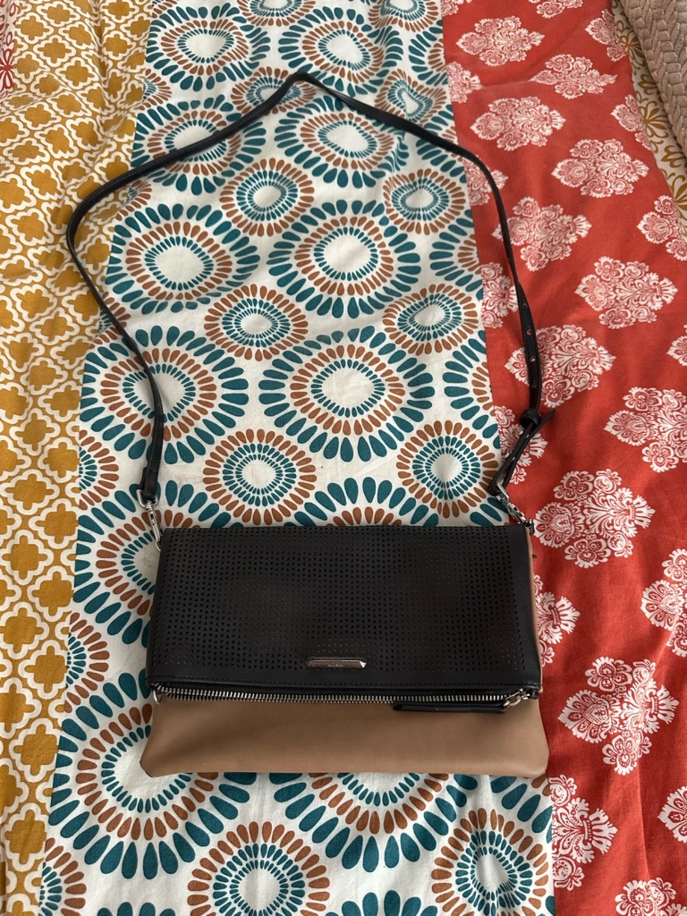 Stella & Dot Covet Black and Tan Perforated Fold-Over Crossbody